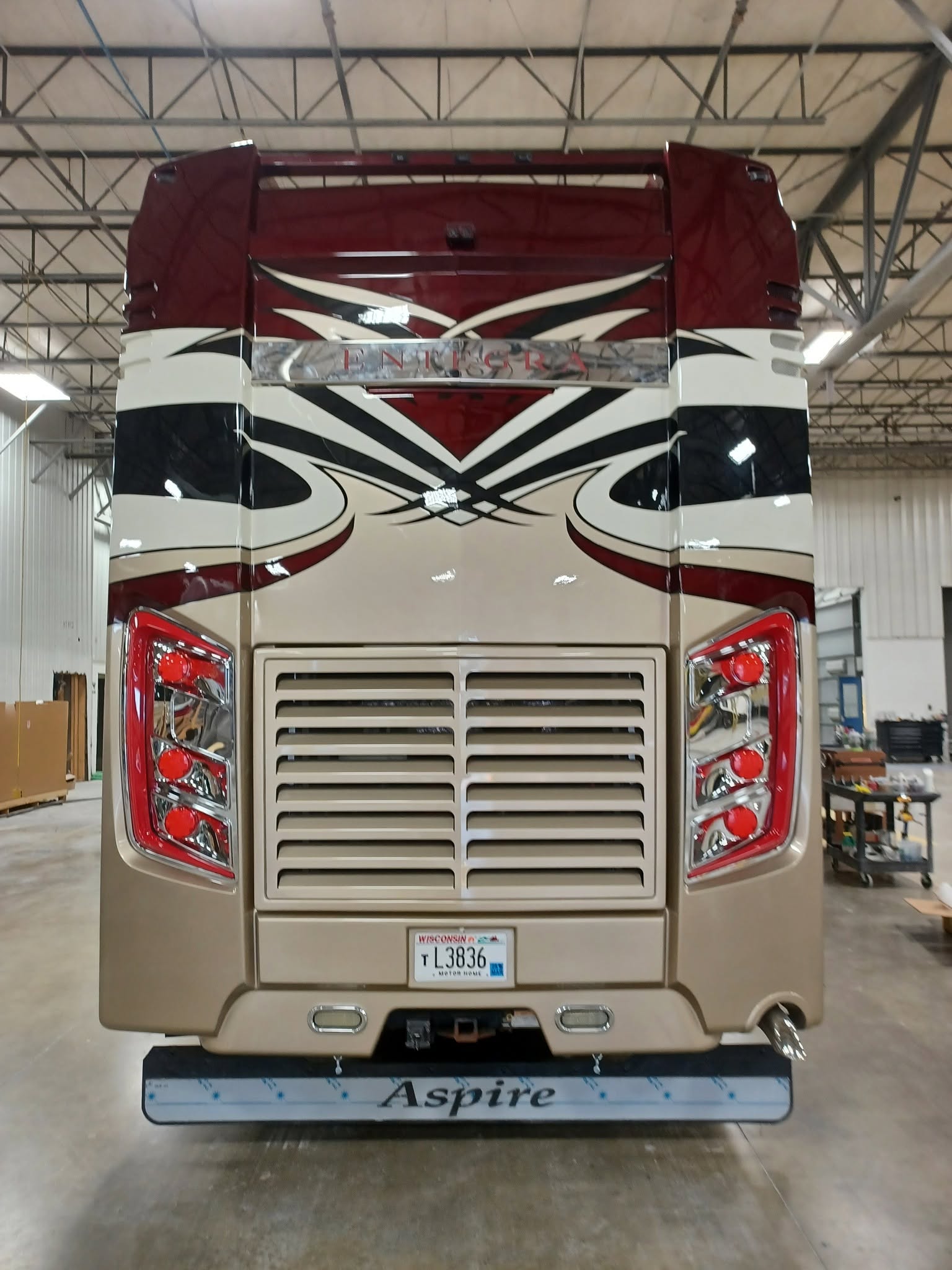 Rear of an Entegra Aspire motorcoach inside a workshop